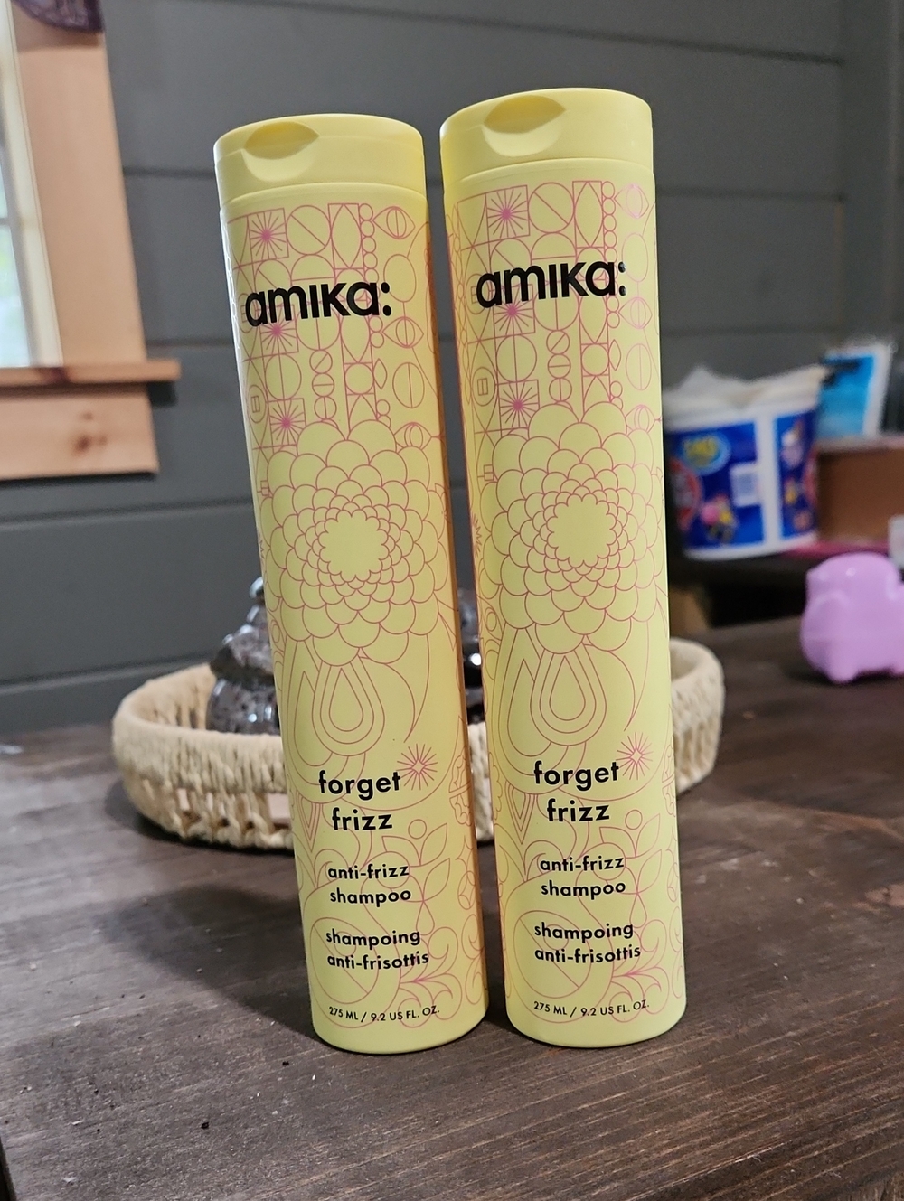 amika Forget Frizz Anti-Frizz Shampoo — Pale Yellow with Pink Accents